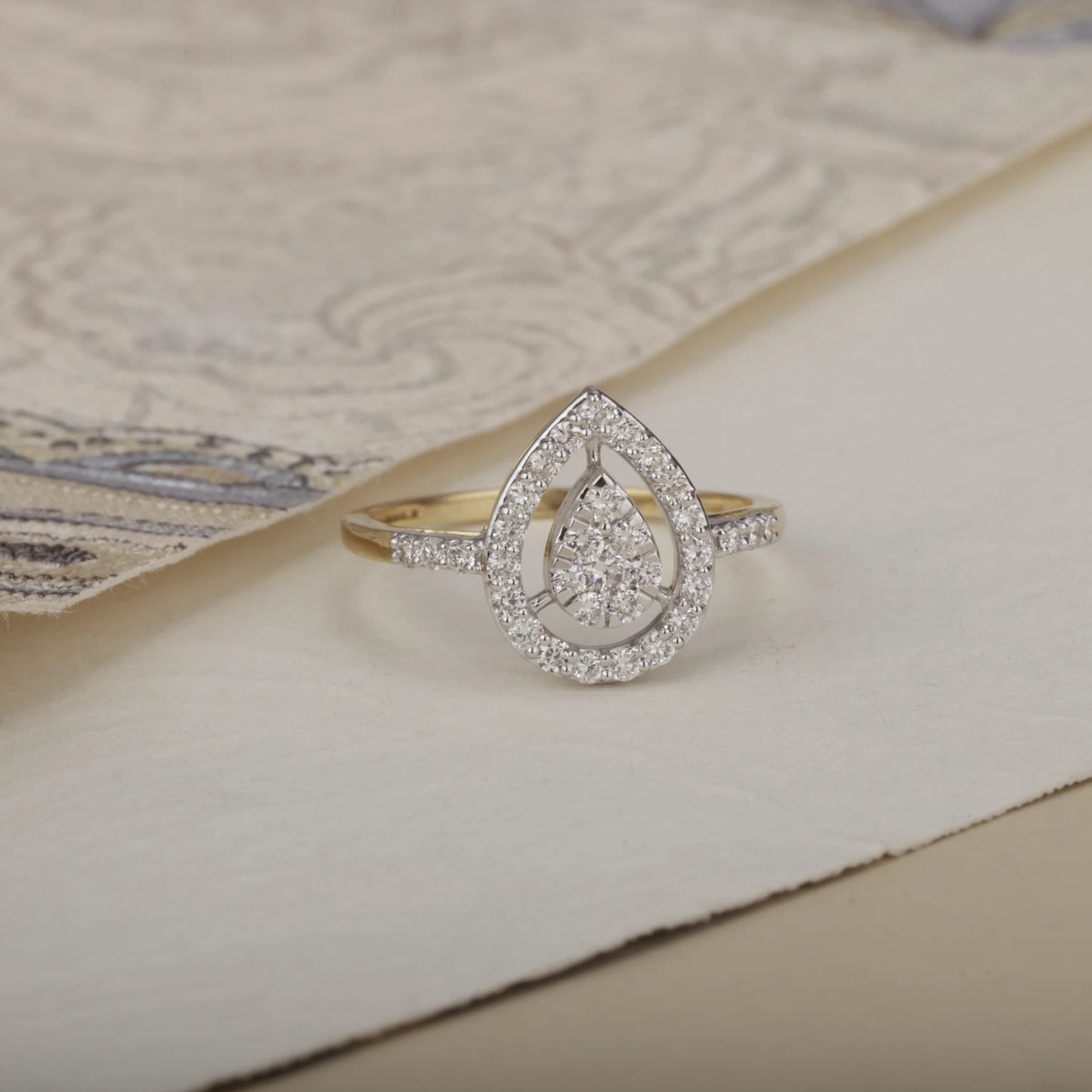 Diamond-Studded Teardrop Gold Engagement Ring